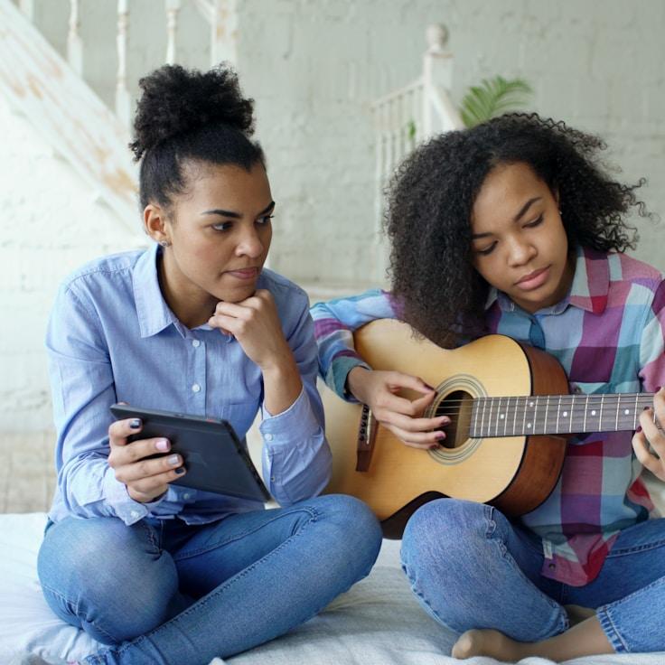 Mobile app project planning workspace with devices and development tools
